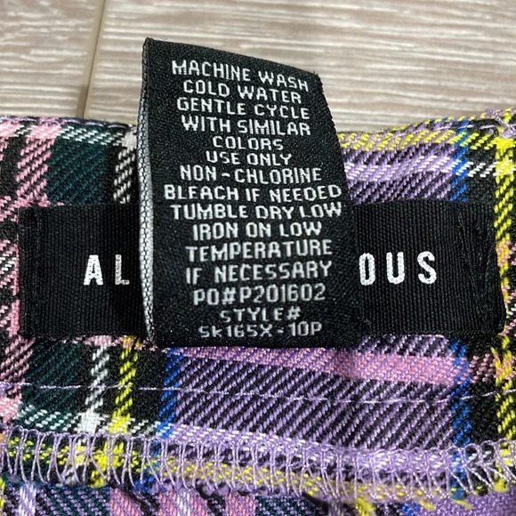 Almost Famous Grommet Belt Plaid Pleated High Rise Mini Skirt Purple Pink L - Picture 12 of 13